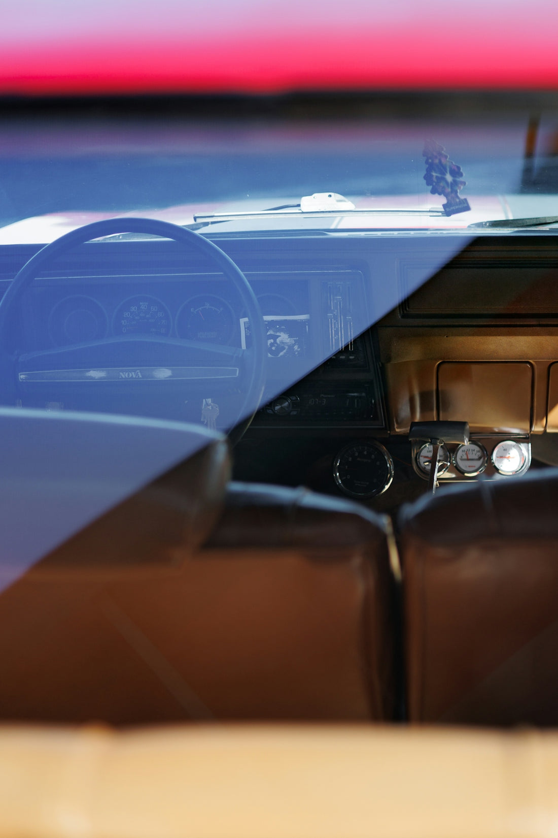 Interior of a classic car at sunset