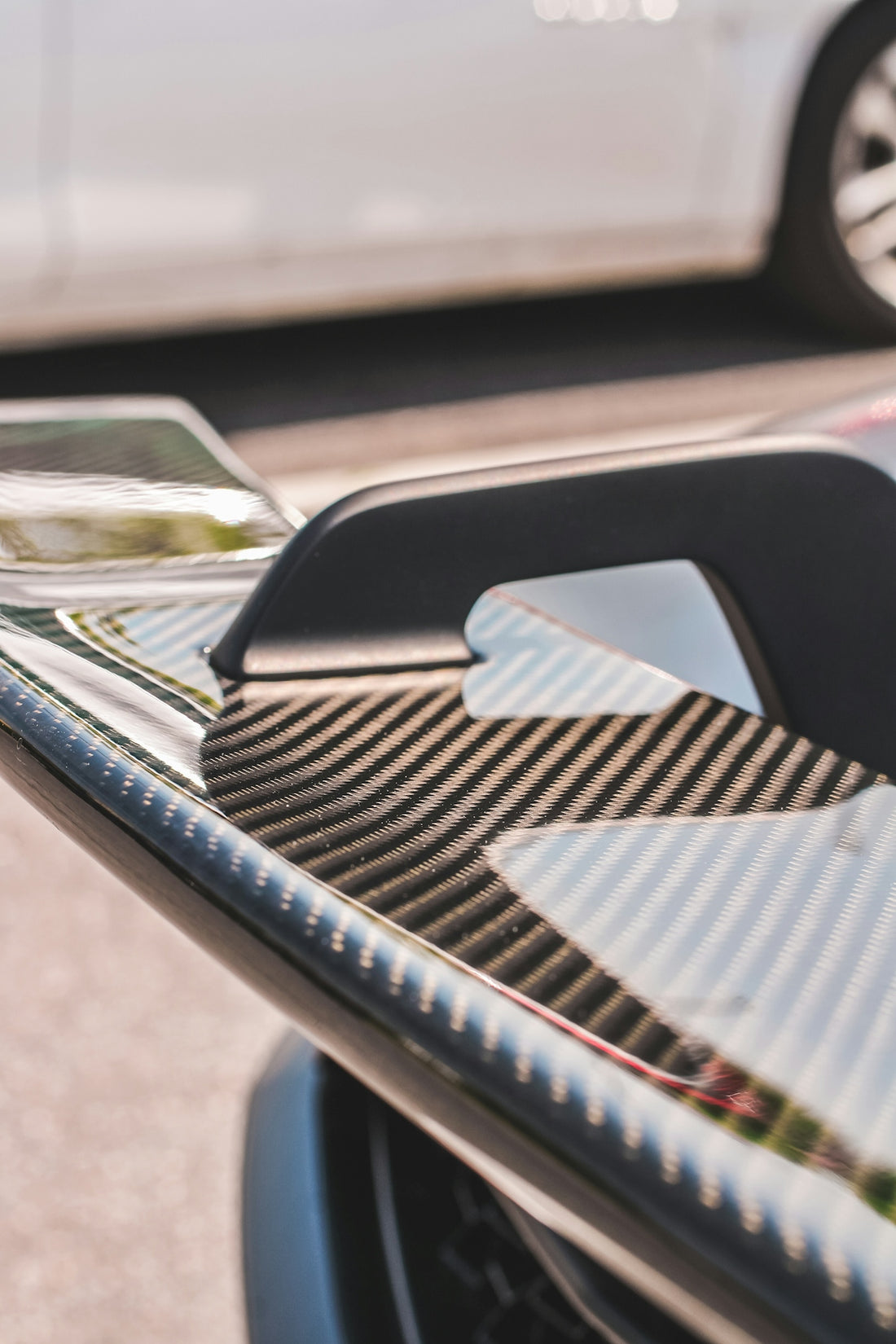 Close-up of a carbon fiber car spoiler